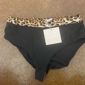 Kittenish swim bottoms. NWT. Size Large
